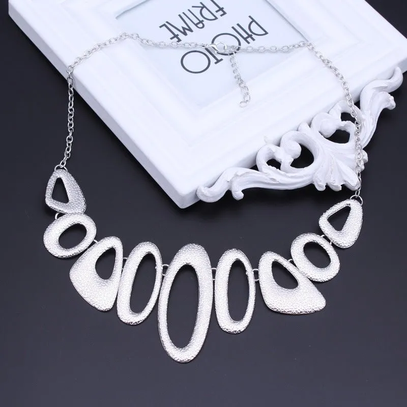 Asymmetrical Oval Metallic Modern Necklace